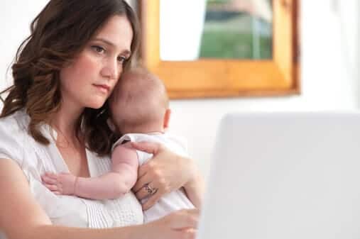 Mother with substance abuse issues holds cute little infant