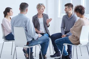 a group sitting down at a benzo addiction treatment center