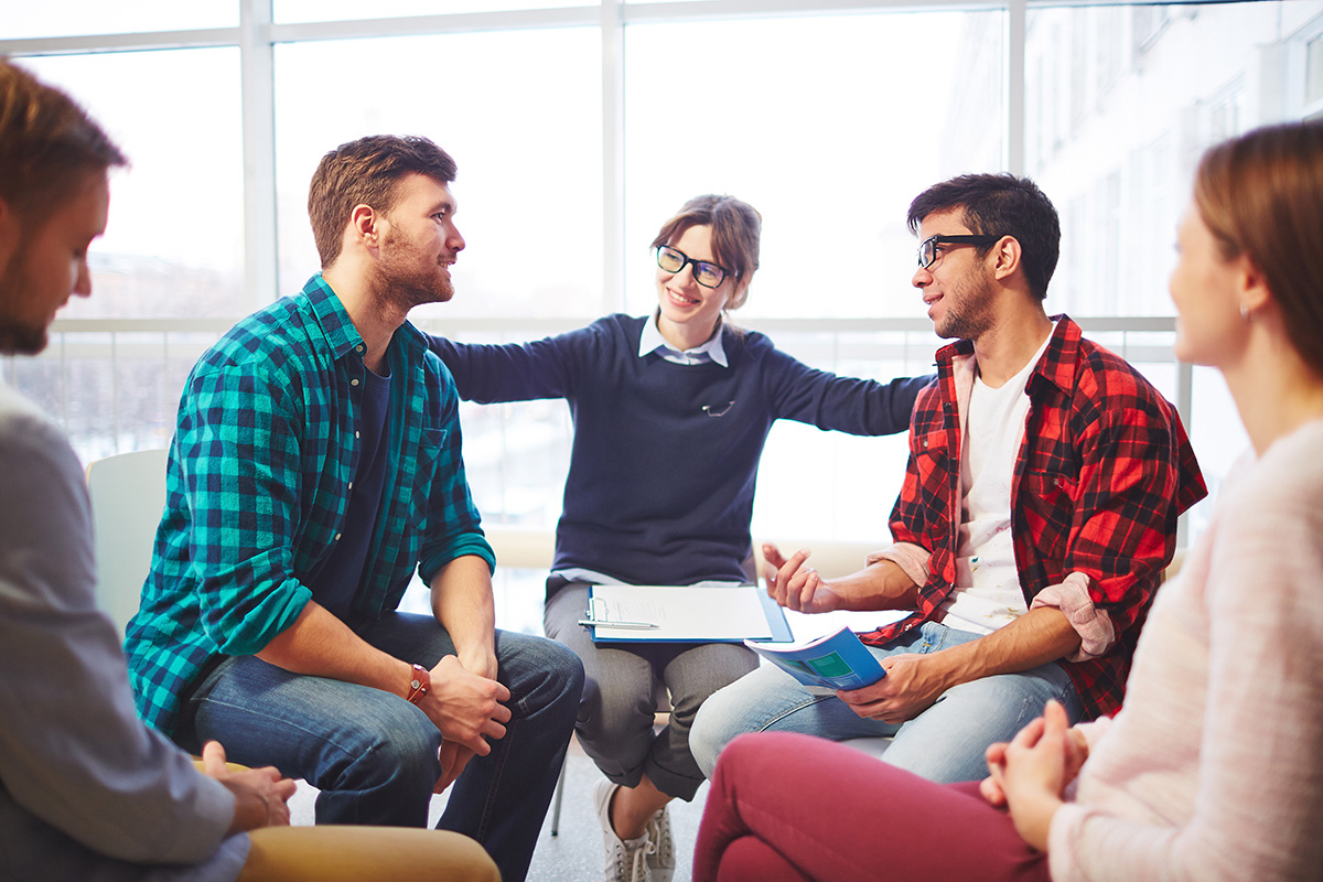 group of individuals learning the Benefits of Group Therapy for Addiction Recovery