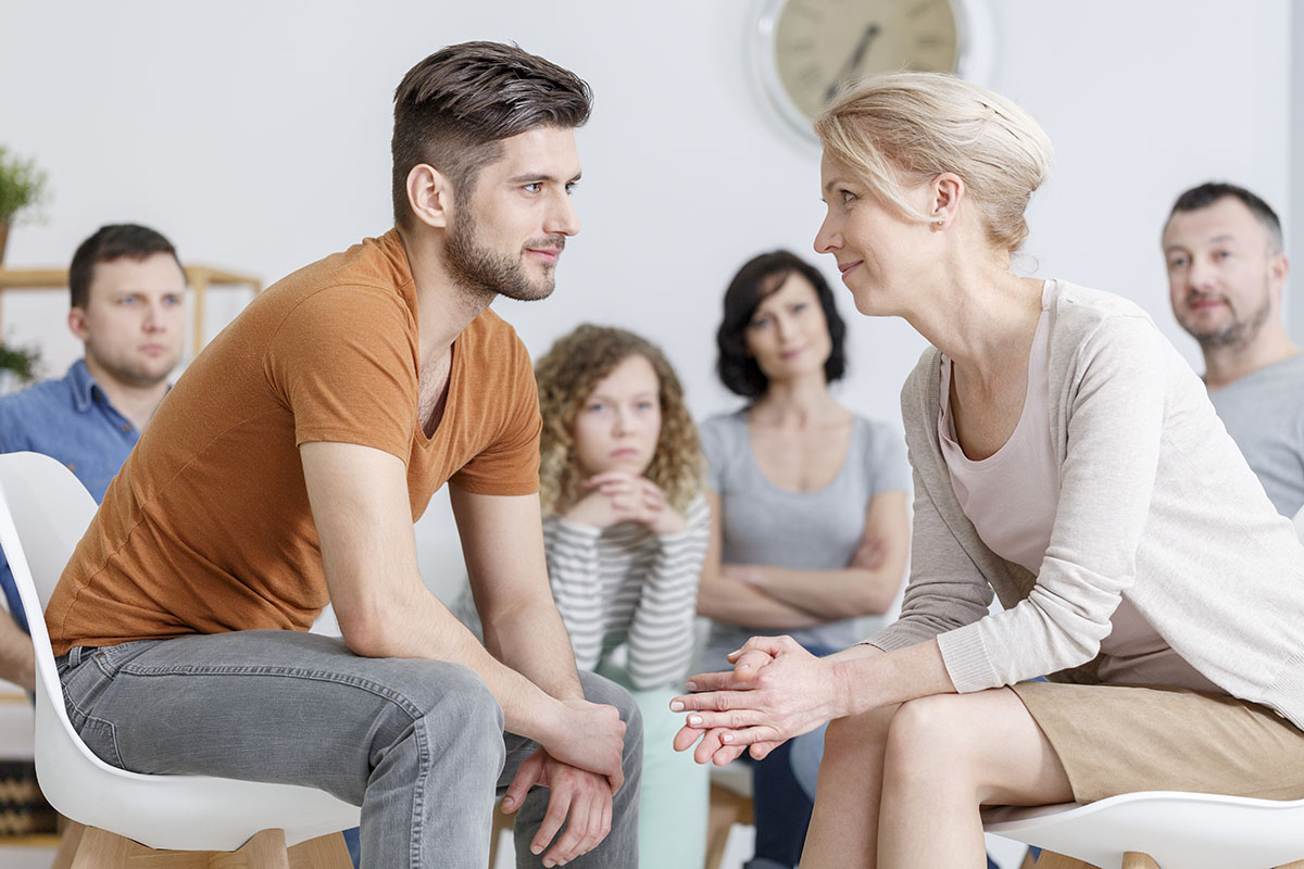 group of individuals discussing an addiction treatment program in Augusta GA