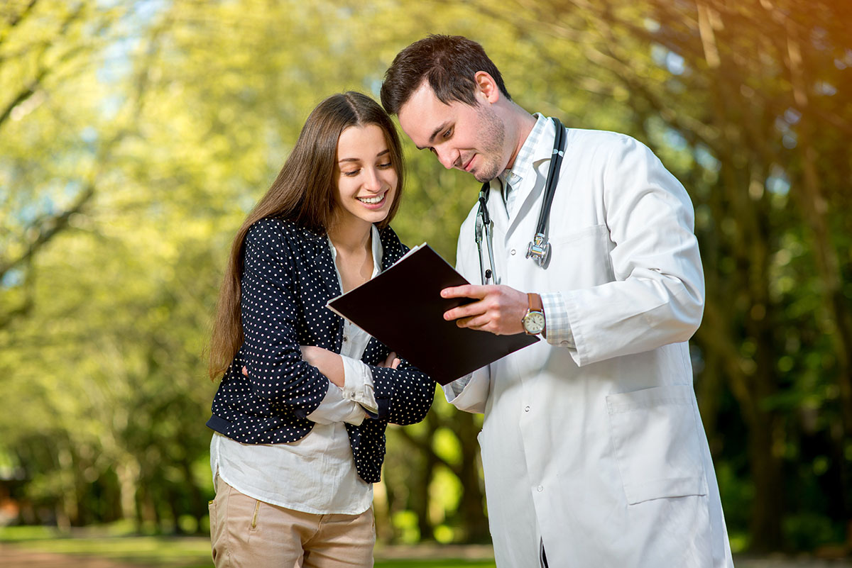 doctor and client discussing breaking the stigma of residential treatment