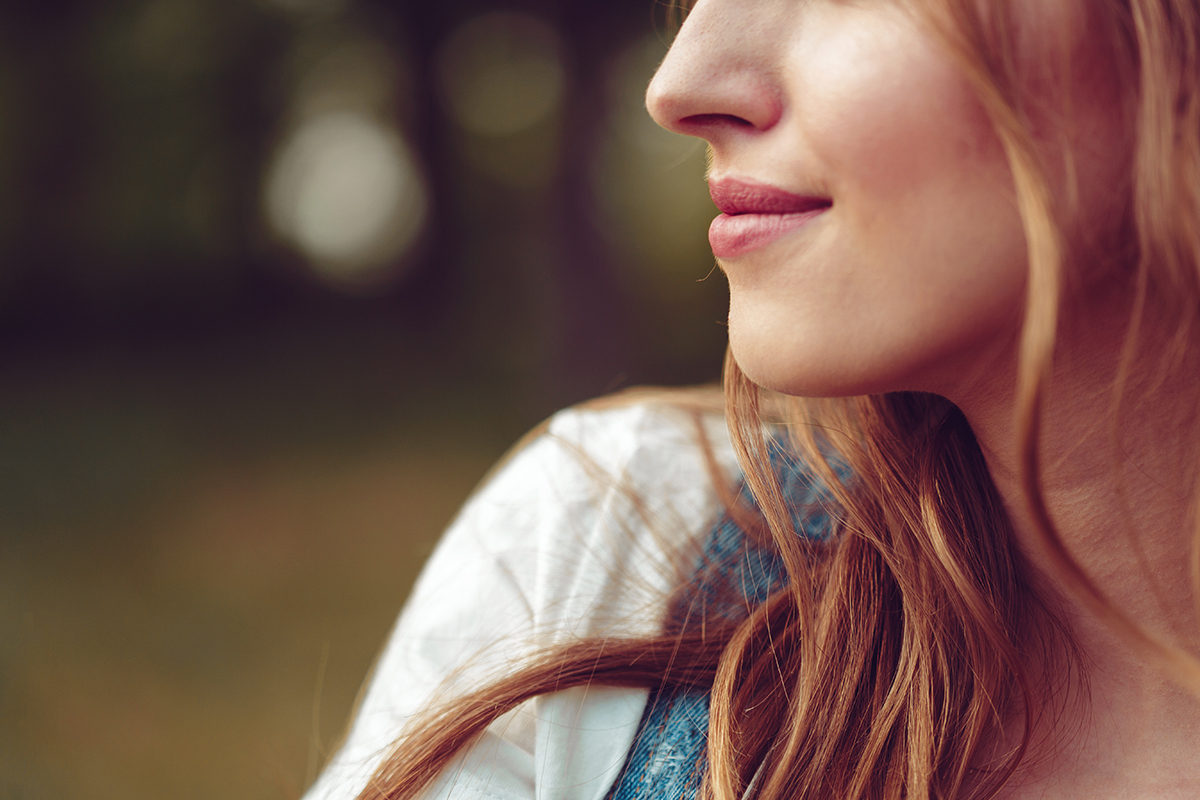 happy woman smiling after alcohol detox