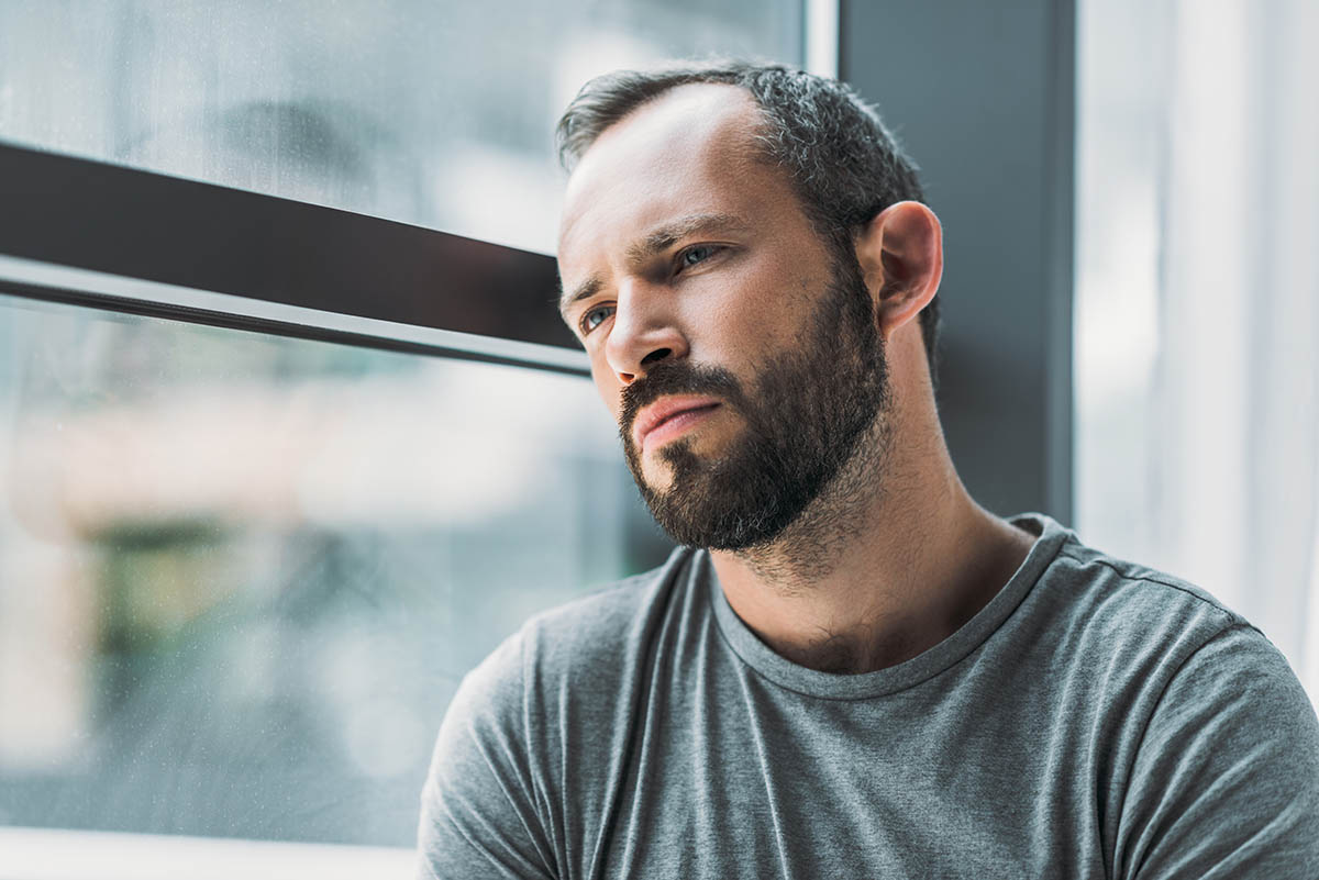 man struggling with the dangers of benzo abuse