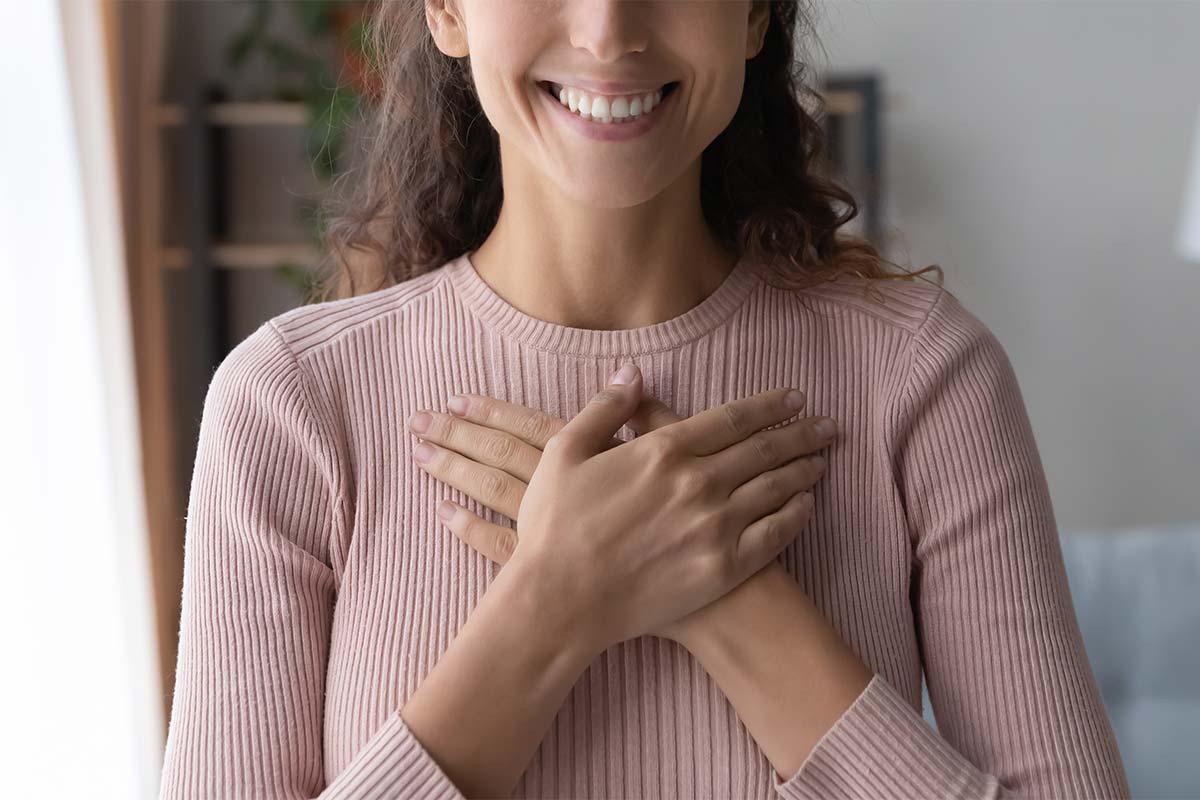 smiling woman is thankful for her recovery