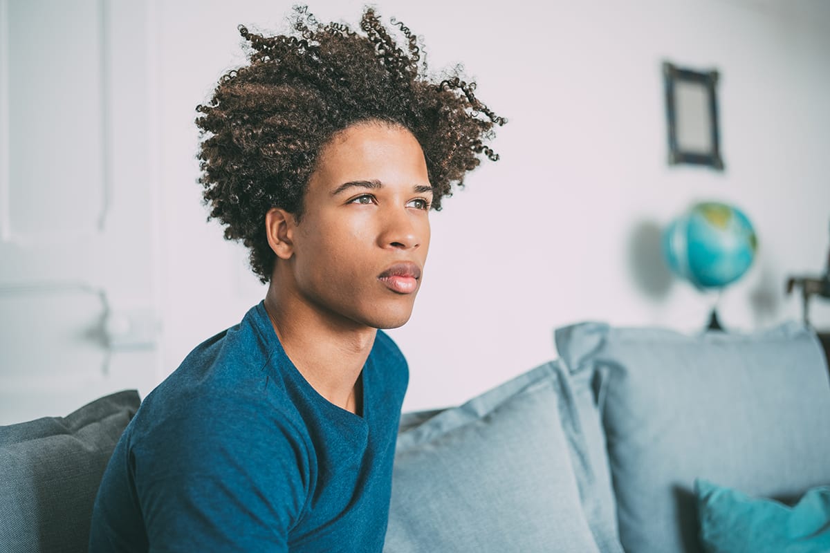 man struggling with social anxiety and addiction